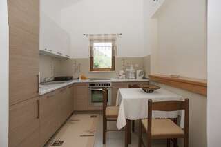 Апартаменты Apartments Nikolić Свети-Стефан Апартаменты Делюкс с 3 спальнями-13